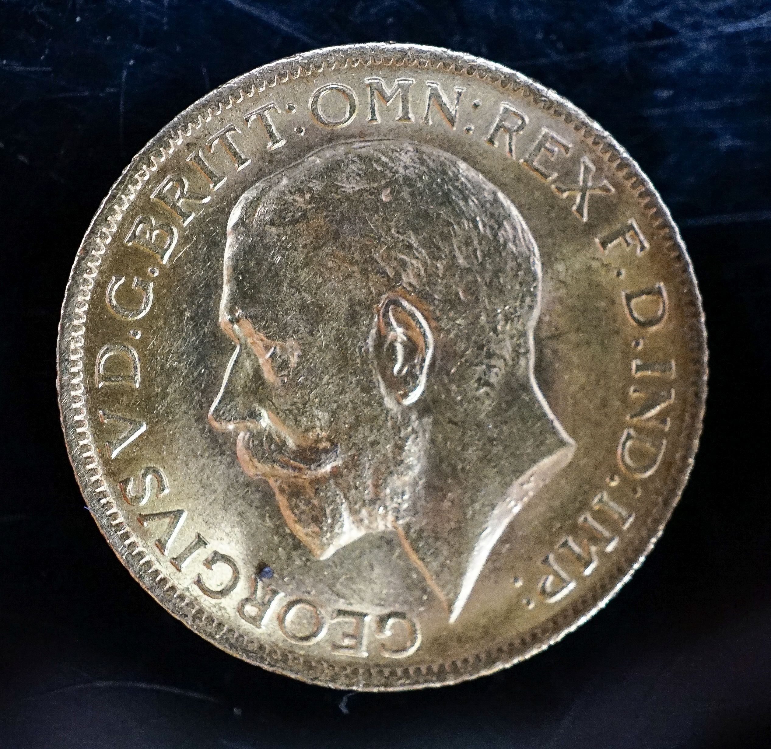 A George V 1912 gold sovereign.